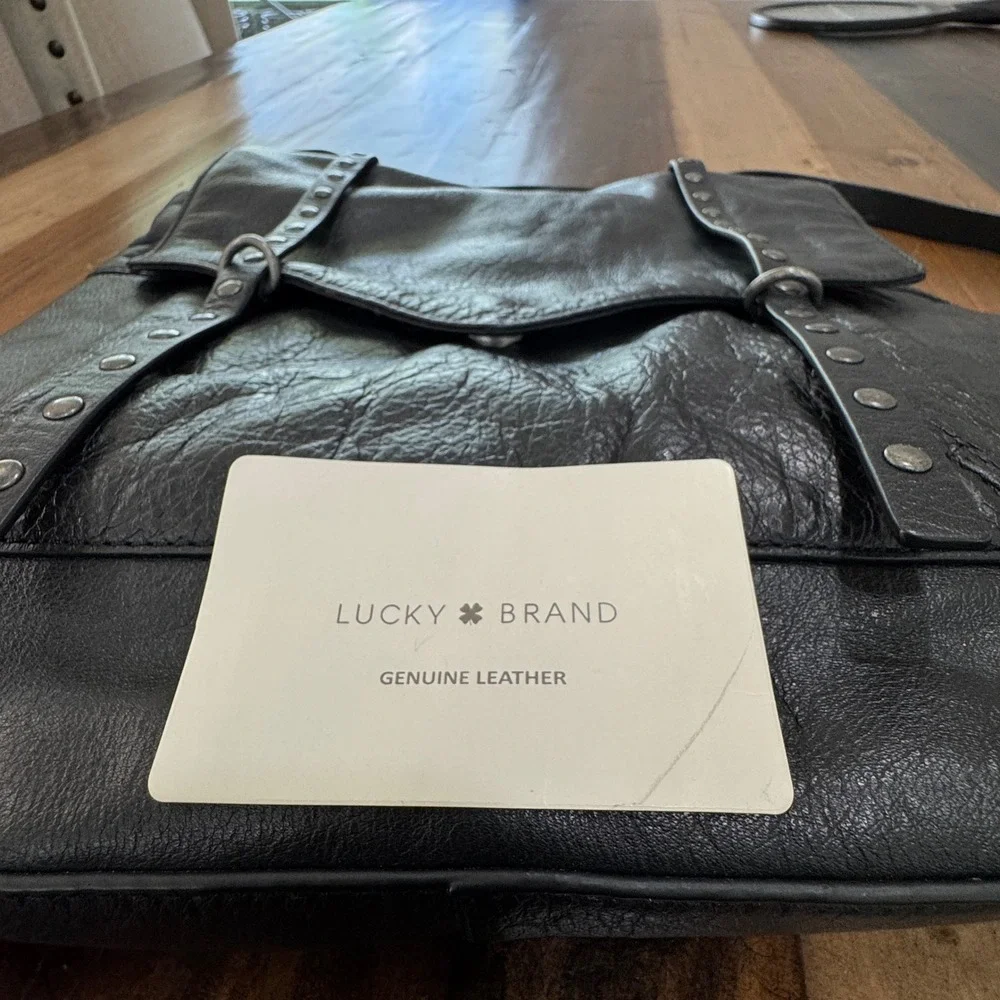 Lucky Brand Black Pebbled Leather Studded Flap Backpack Bag